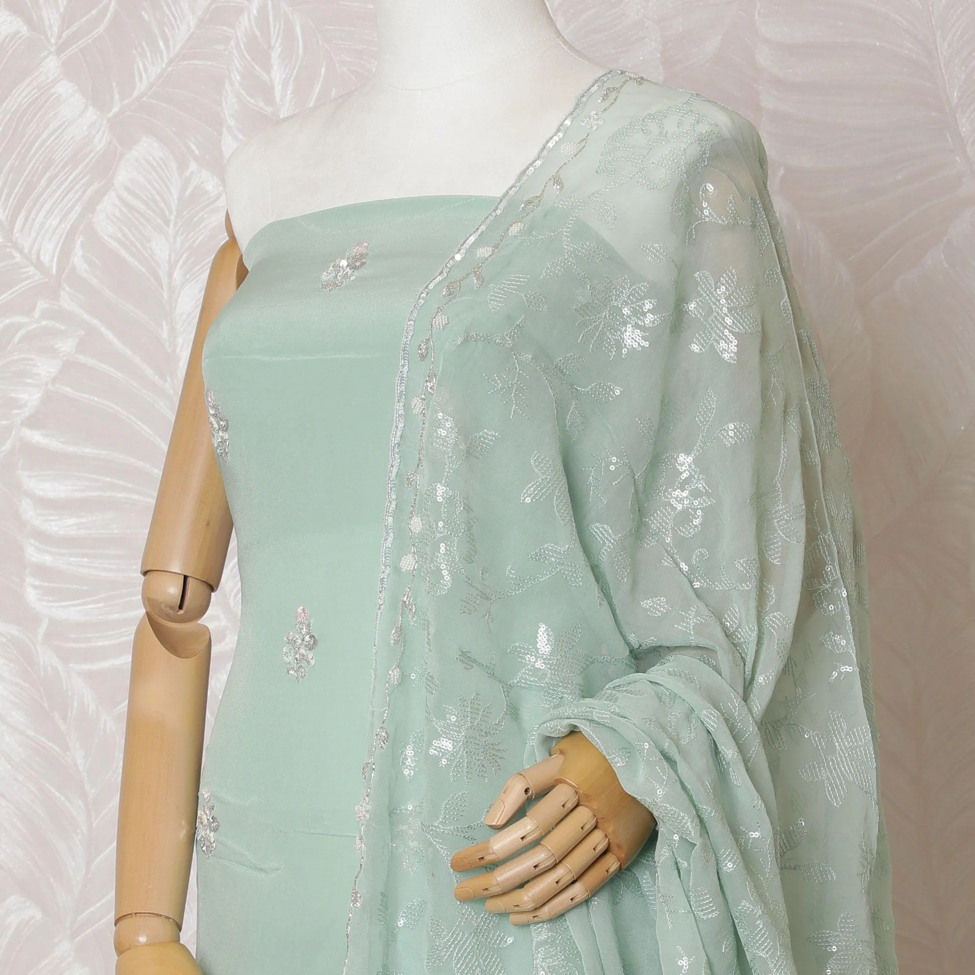 Mint green Premium pure silk crepe kameez with multicolor bead and sequin embroidery in floral design. Mint green plain salwar having same tone chiffon dupatta with multicolor bead and sequin embrodiery-D15004