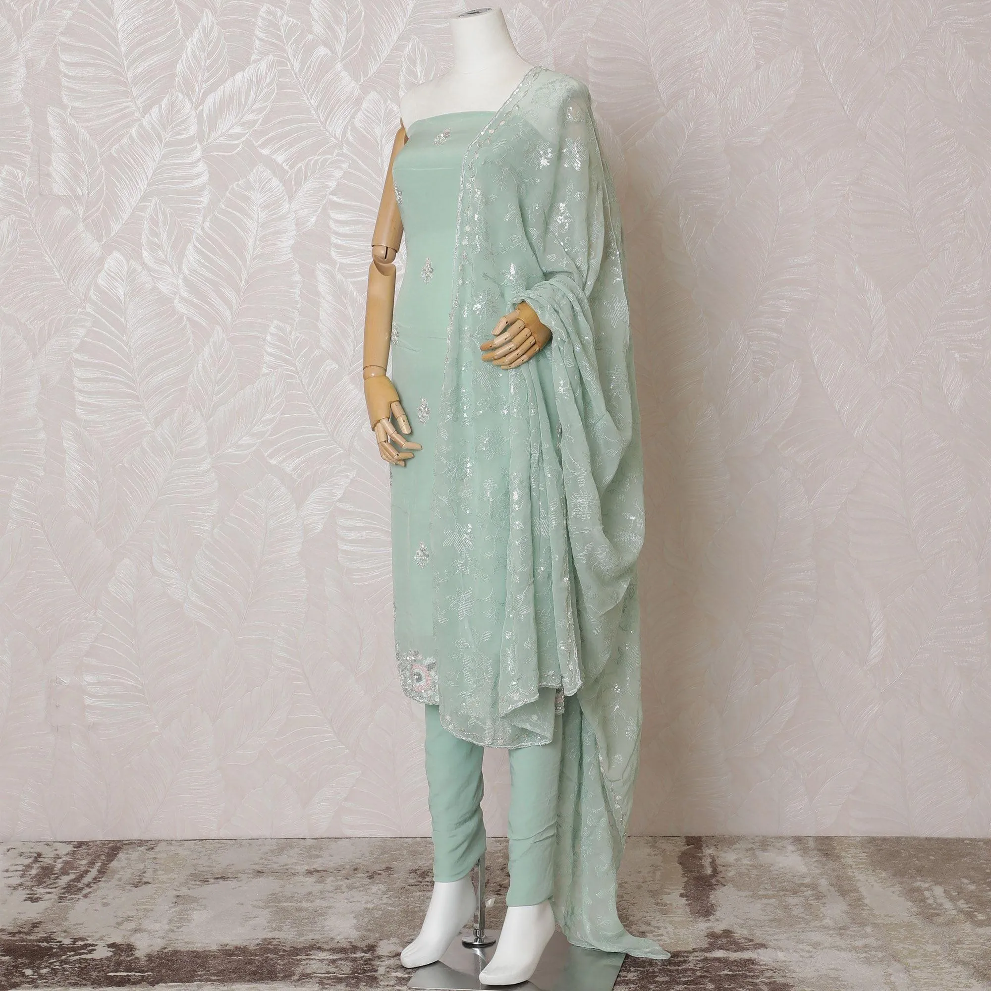 Mint green Premium pure silk crepe kameez with multicolor bead and sequin embroidery in floral design. Mint green plain salwar having same tone chiffon dupatta with multicolor bead and sequin embrodiery-D15004