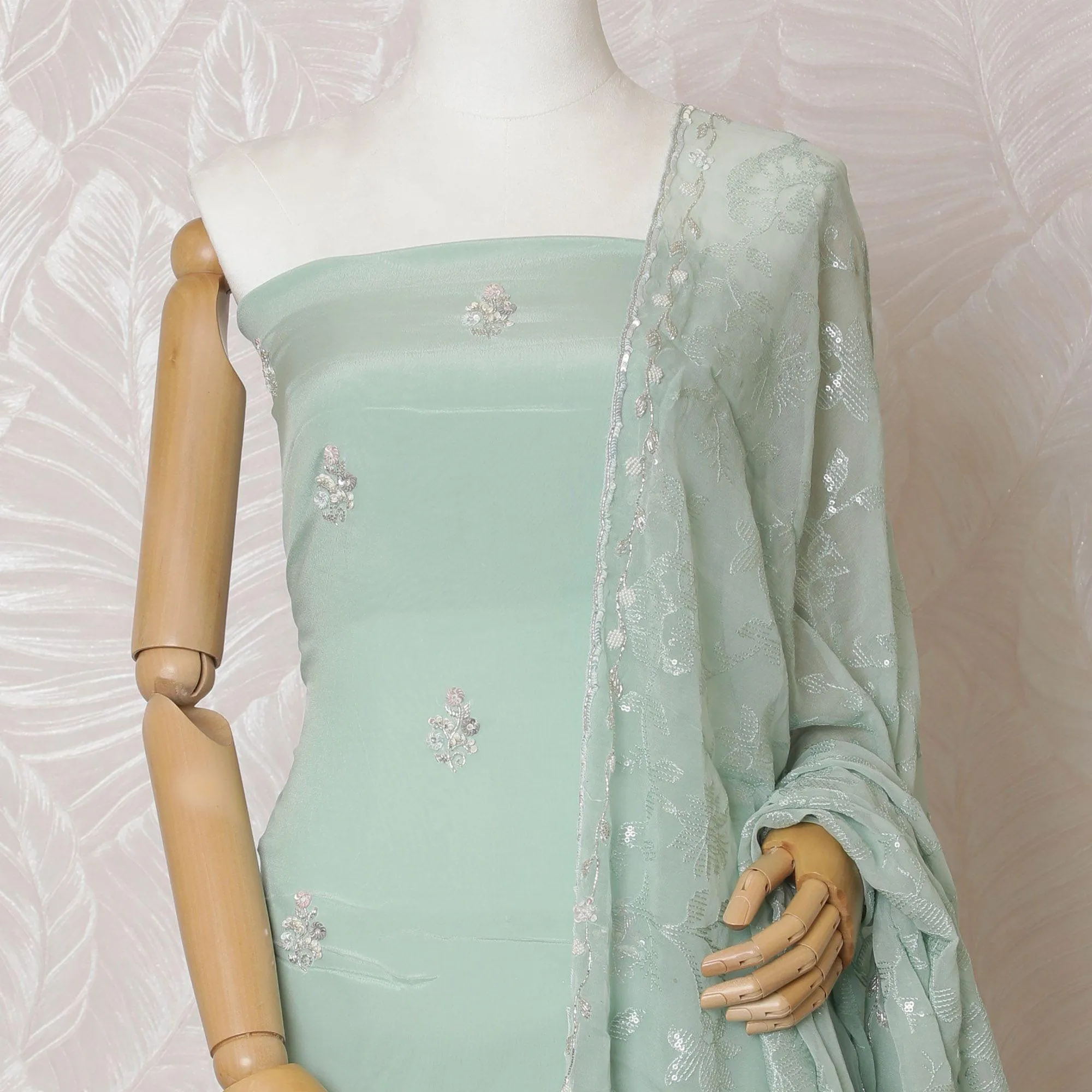 Mint green Premium pure silk crepe kameez with multicolor bead and sequin embroidery in floral design. Mint green plain salwar having same tone chiffon dupatta with multicolor bead and sequin embrodiery-D15004