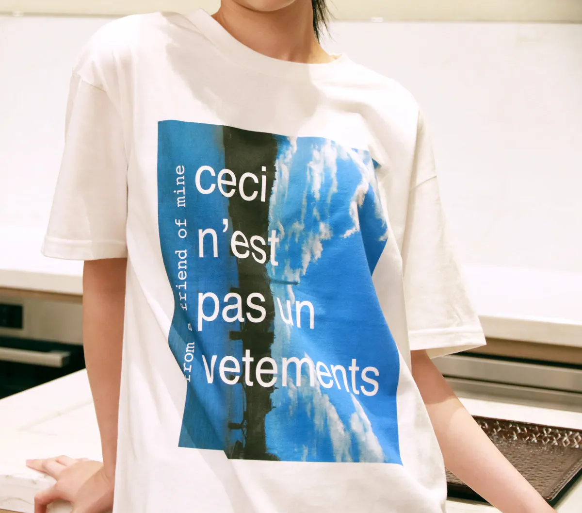 Printed white T-shirt "Ceci n'est pas un vetements" from a friend of mine