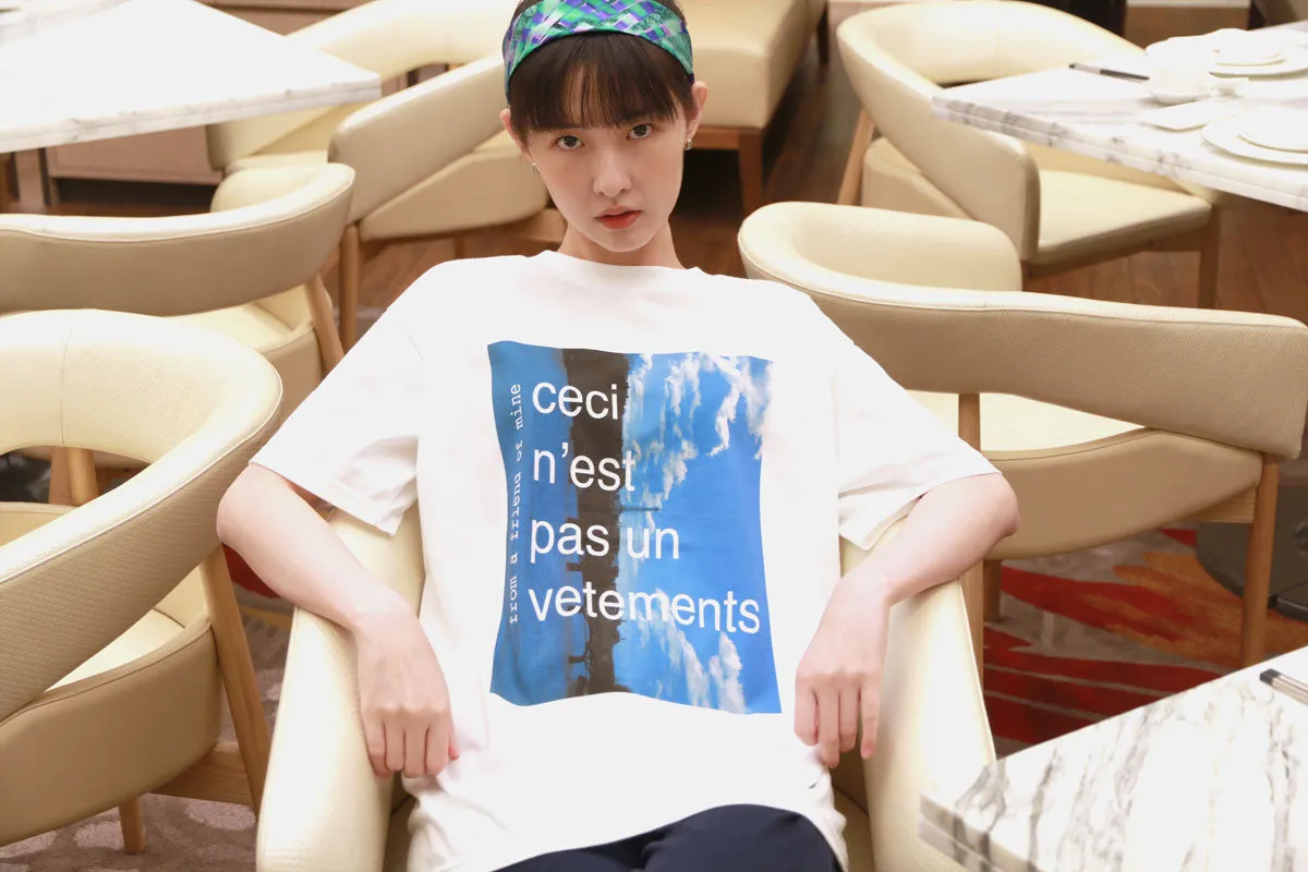 Printed white T-shirt "Ceci n'est pas un vetements" from a friend of mine